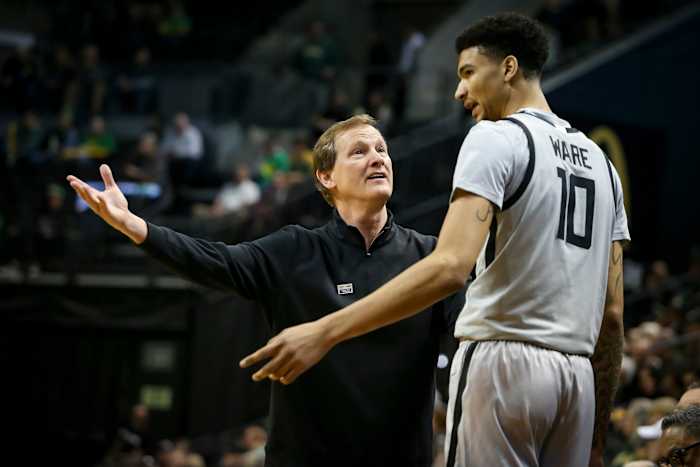 Oregon coach Dana Altman talks to center Kel'el Ware as the Ducks host the Colorado Buffaloes at Matthew Knight Arena in Eugene, Ore. Thursday, Jan. 26, 2023.